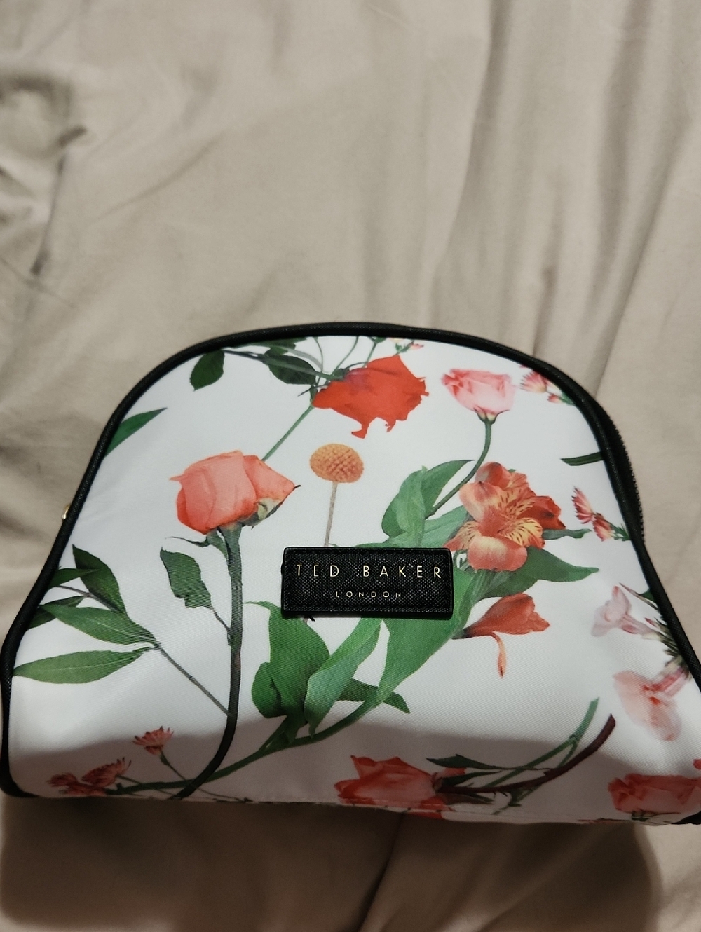 Ted Baker London White Floral Cosmetic Bag with Green and Coral Accents